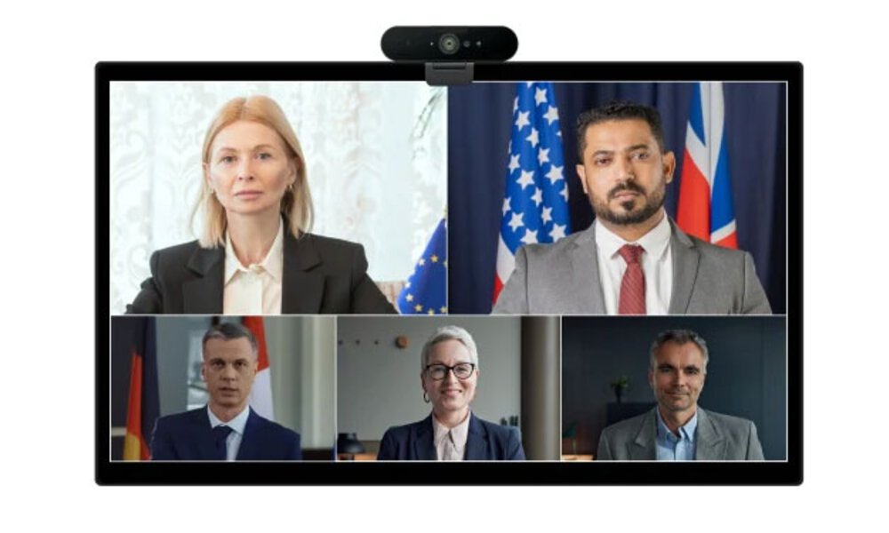 Bildschirm mit Pexip Videokonferenz und Personen aus dem politischen Sektor 